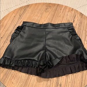 Black leather shorts